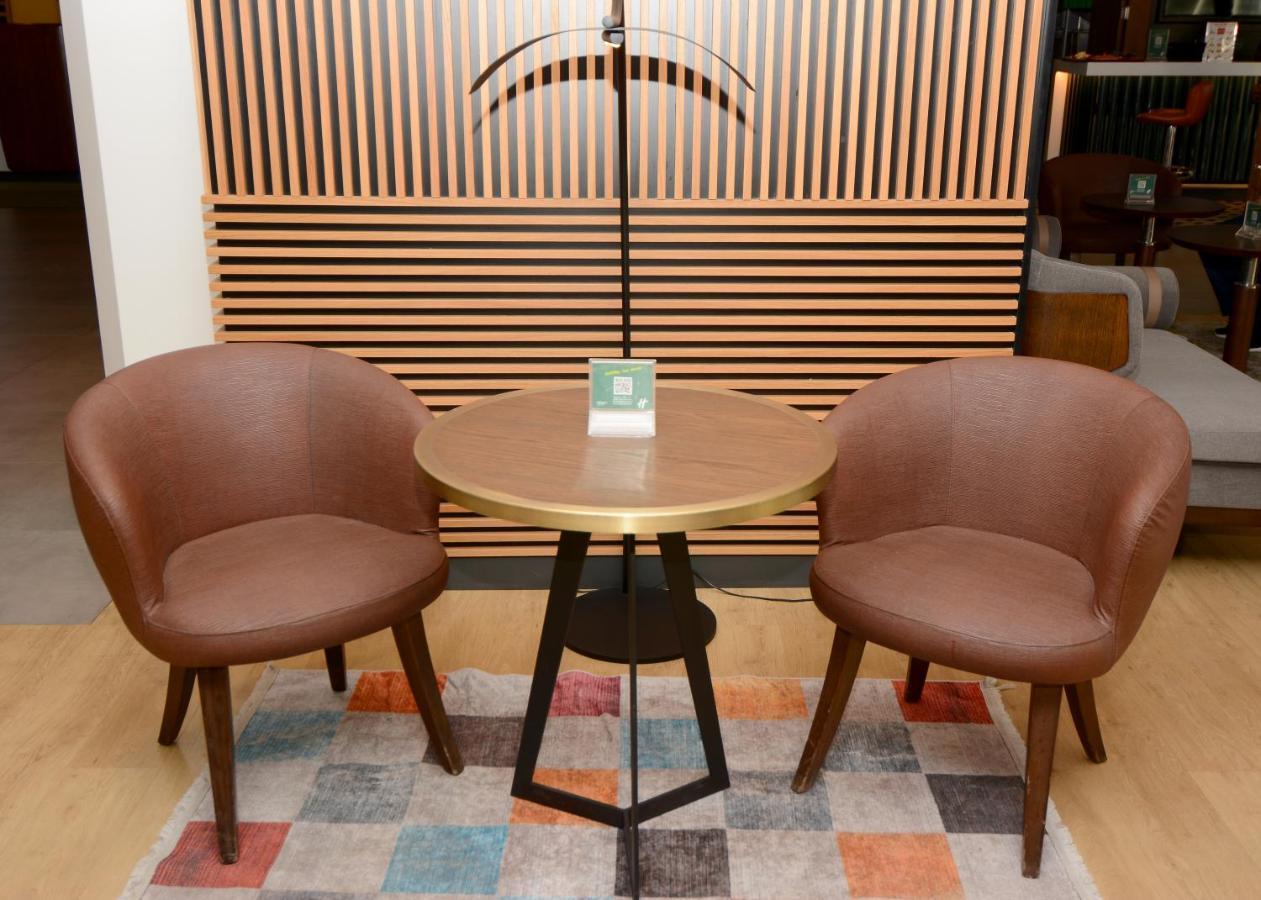 Holiday Inn Istanbul City By Ihg Екстериор снимка A pair of chairs and a table